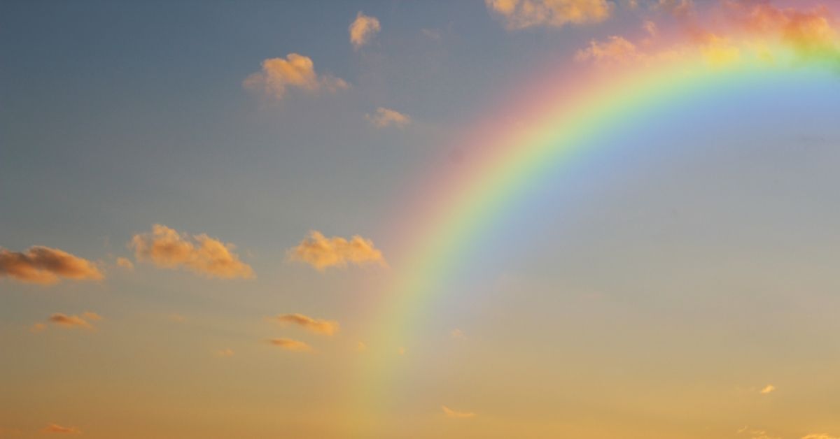 A rainbow at sunset.