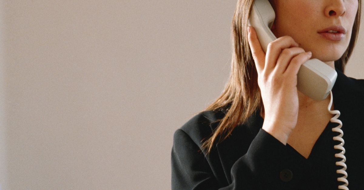 A woman talking on the phone.
